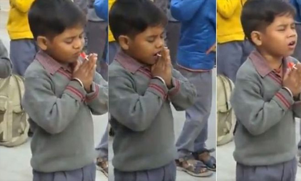 boy enjoying candy during school assembly viral video 