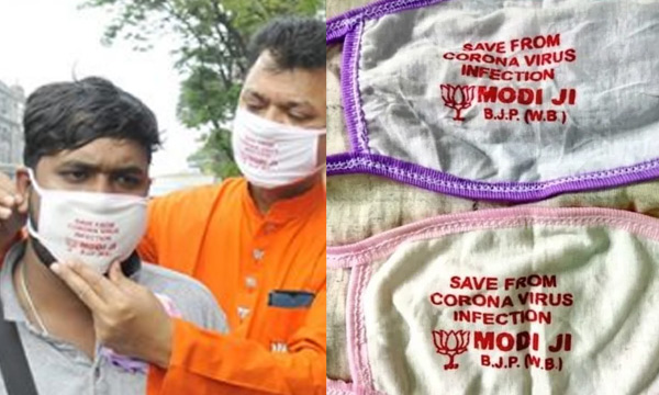 BJP workers distribute Modi-named masks to fight corona