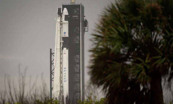 spacex crewed mission postponed