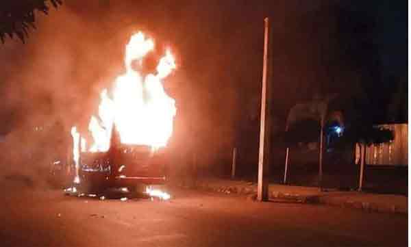 man tied up in a tree and killed in fire