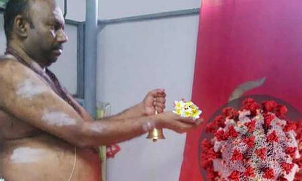 Made of thermocol and sitting on a 'pallival,' Corona Devi is a goddess