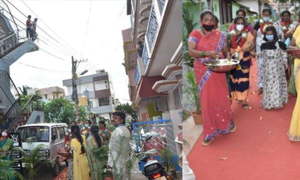 rajanikanth fan in karntaka welcome his corona cured wife in kabali style 