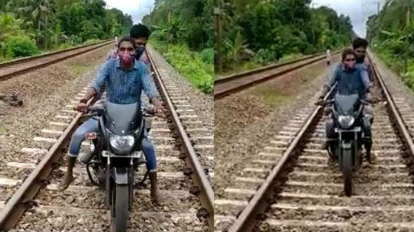 to escape from containment zone two men travels through railway track