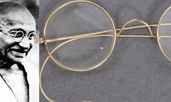 gandhi's gold plated glasses