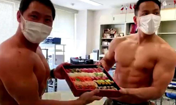 in japan one hotel body builders delivering food in shirtless