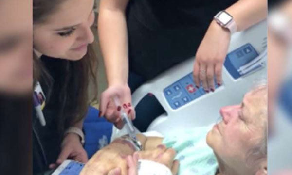 nurse singing for cancer patient 