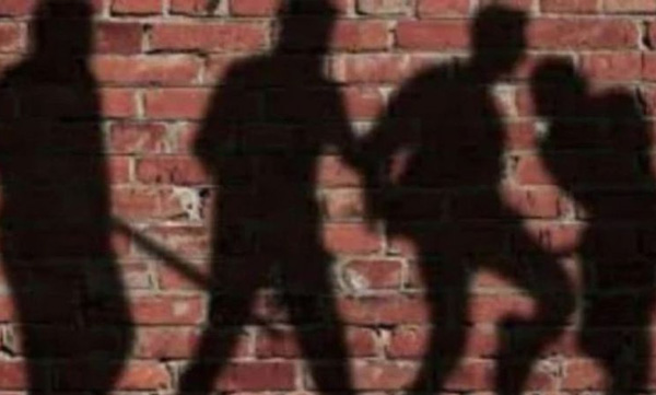 widow and youth tied in the electric post and locals beaten brutully