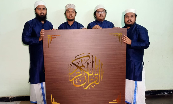 longest manuscript quran written by tailors family in kayamkulam