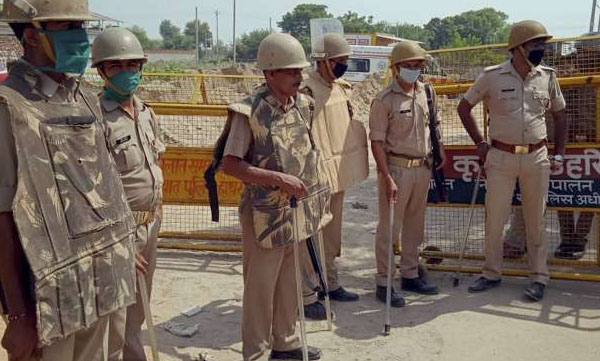 UP Police erect fence in Hathras victims villages 