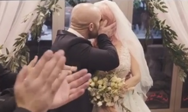 Bodybuilder 'ties the knot' with his doll