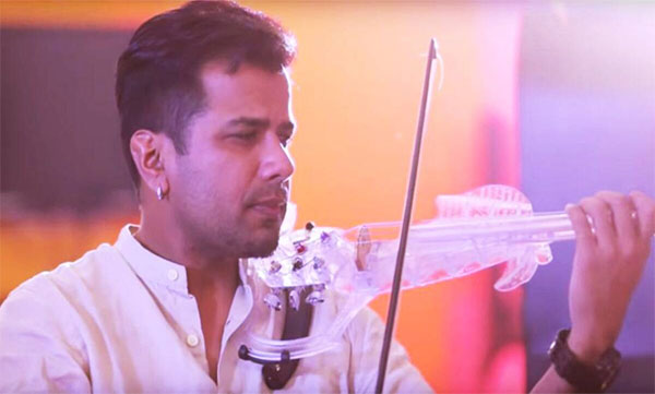 violinist Balabhaskar , insurance police
