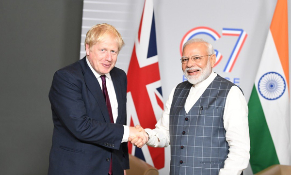 uk invites pm modi to attend g7