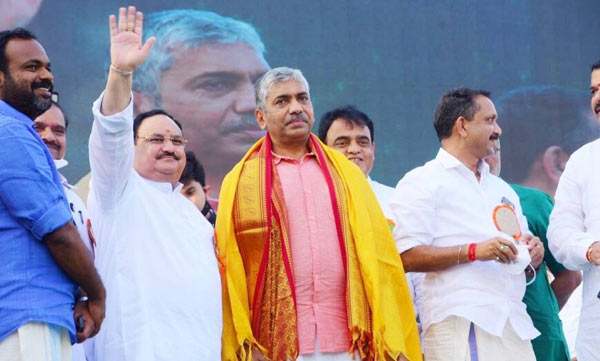 Former DGP Jacob Thomas has joined the BJP