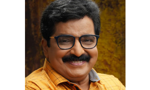 protest against MK Muneer