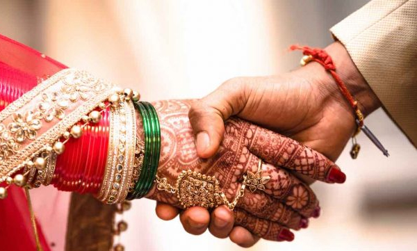 violating covid protocol groom and his father arrested