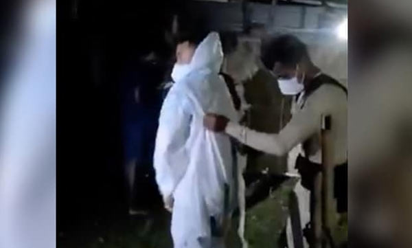 Assam Police Officer Wears PPE Kit To Shift Covid-19 Patient To Hospital