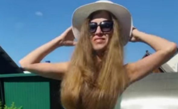 girl wearing her long hair as dress