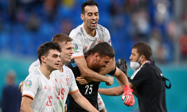 Spain survived another scare to beat 10-man Switzerland in a dramatic penalty shootout