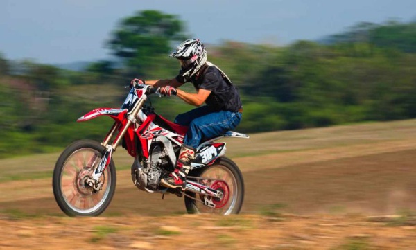Young man caught for bike race in high way