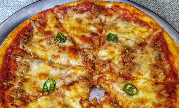consumer-court-fined-pizza-store-11000-for-selling-cover-for-price
