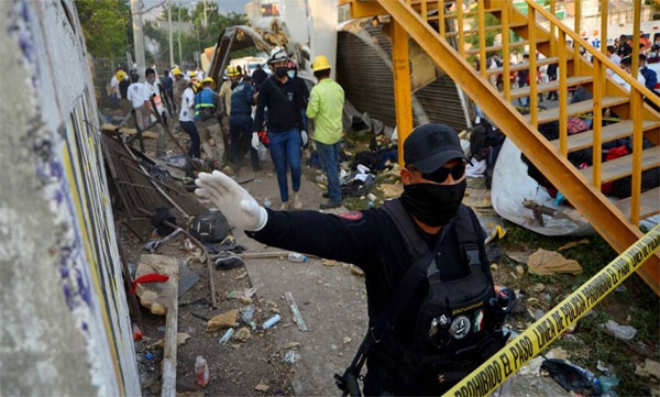 truck crash in south Mexico; 49 migrants dead, 58 injured