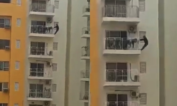 faridabad-man-hangs-from-12th-floor-balcony-to-do-stretching-exercises