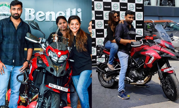 meera-anil-and-husband-bike