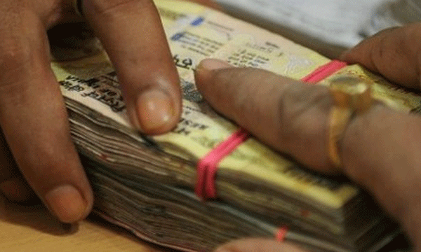 allowed Torres trucks  for  overload ;  RTO officers get 3 lakhs bribe  in one month 