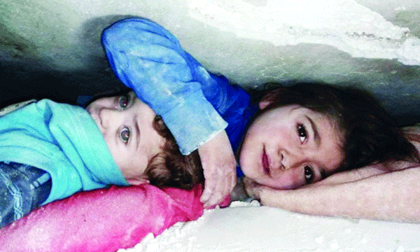 7-Year-Old Girl Shielding Brother Under Rubble In Syria