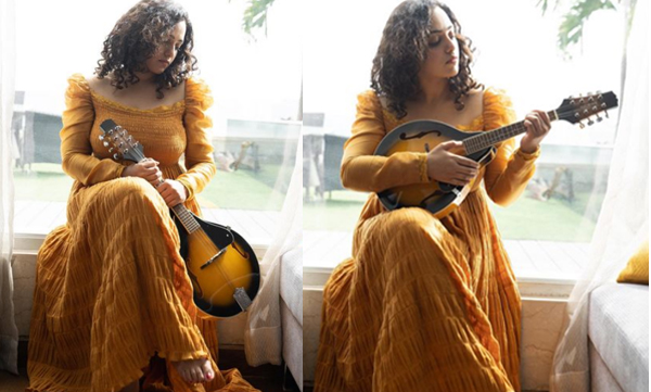 actress-nithya-menen-share-her-yellow-gown-pics