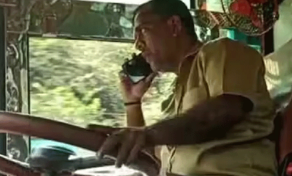 Driver used mobile phone 8 times while driving the bus; Pictures are out