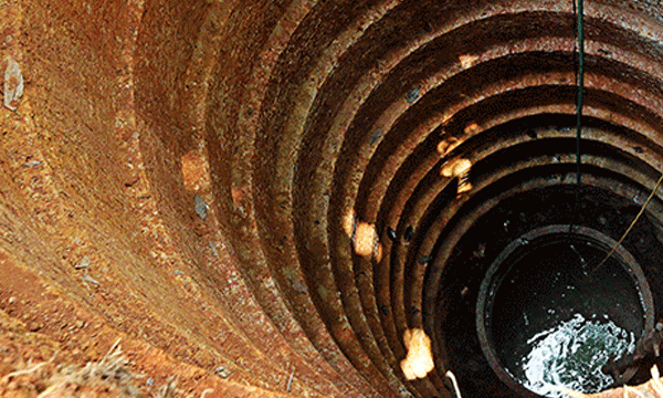 & women come together to dig well for friend