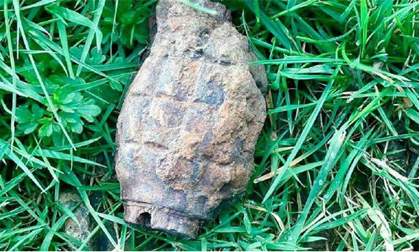 A 9-year-old boy was playing in the backyard and found an unexploded grenade