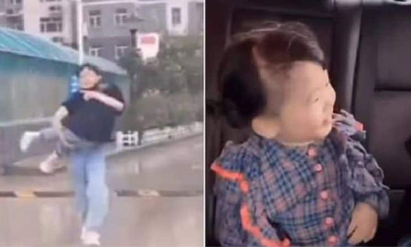 The brother who keeps his younger sister safe by wrapping him in a t-shirt without getting wet from the rain. Watch the video...