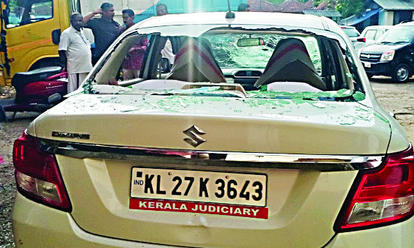 smashed the windows of the judge's car