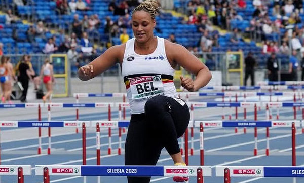 There is no one to compete in the hurdles; The shot put player entered the field to avoid the disqualification of the team