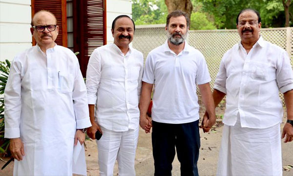 The Congress is not afraid of the politics of intimidation and revenge; Rahul Gandhi holding Sudhakaran's hand