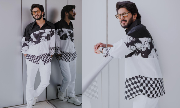 Dulquer in black and white trendy dress to celebrate the release of King of Kotha, pictures trending