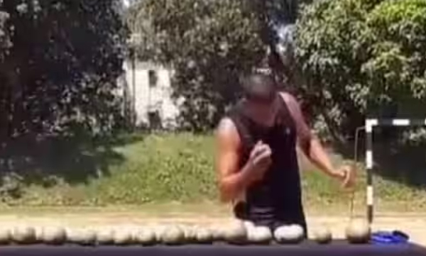 dharmendra-singh-man-from-bihar-broke-57-coconuts-with-his-head