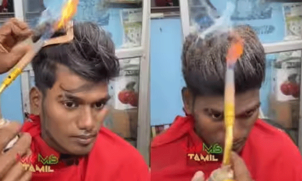 barber-cutting-hair-with-fire-video