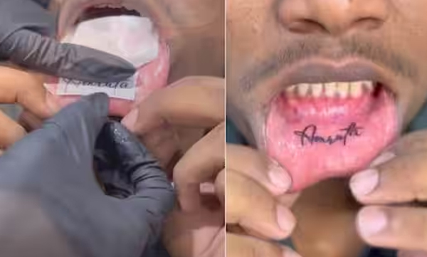 man-getting-tattoo-inside-mouth-for-his-love