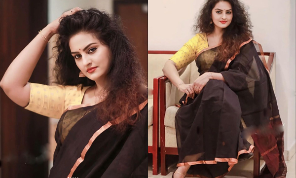 Suchithra Nair stylish look in black saree