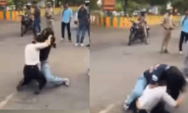 girls-fight-in-middle-of-the-road-police-watching-video-s