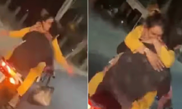 couple-romancing-in-moving-bike-police-file-case-video