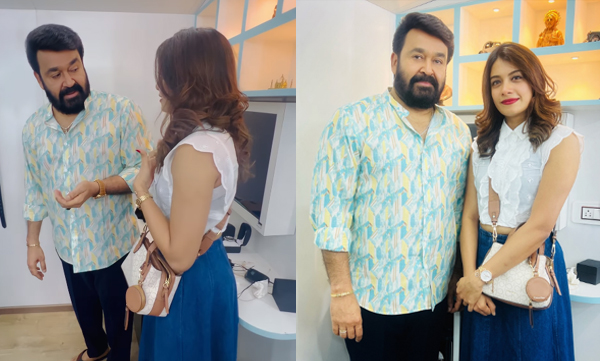 bigg-boss-malayalam-6-grand-finale-dilsha-prasannan-with-mohanlal