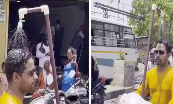 video-of-a-man-taking-a-shower-on-a-scooter-after-extreme-heat-has-gone-viral