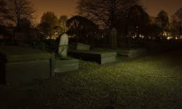 This is a different movie show; Film screening at the cemetery for the dead