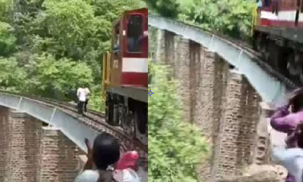 photo-shoot-in-track-train-arrives-couple-jumps-into-90-ft-gorge