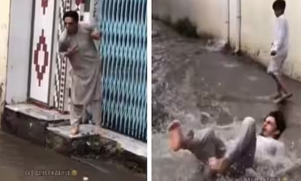 video-of-a-young-man-trying-to-jump-over-a-waterlogged-road-but-falling-on-the-road-has-gone-viral