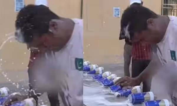 pakistan-man-muhammad-rashid-crush-39-cans-with-his-head-set-guinness-world-record